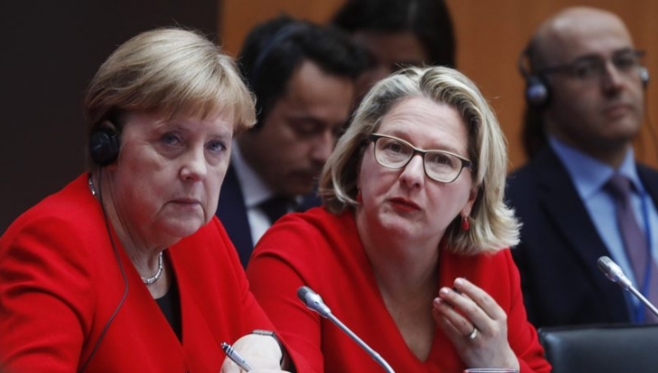 <p>German Chancellor Angela Merkel and Environment Minister Svenja Schulzeat the Petersberg Climate Dialogue in Berlin. Image: EPA-EFE/Michele Tantussi / POOL [Michele Tantussi/ epa]</p>